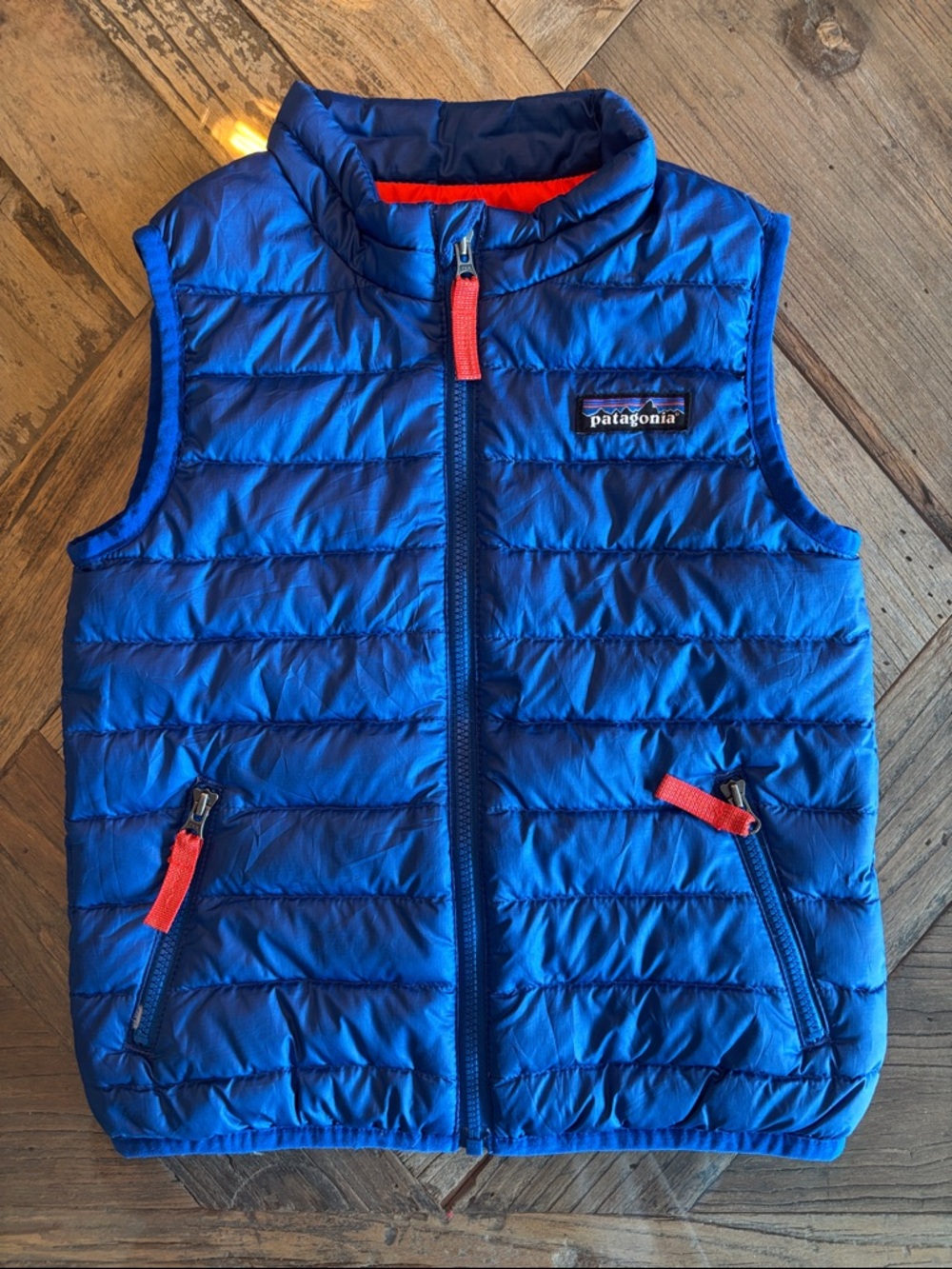 Patagonia Kids Royal Blue Puffer Vest with Orange Trim